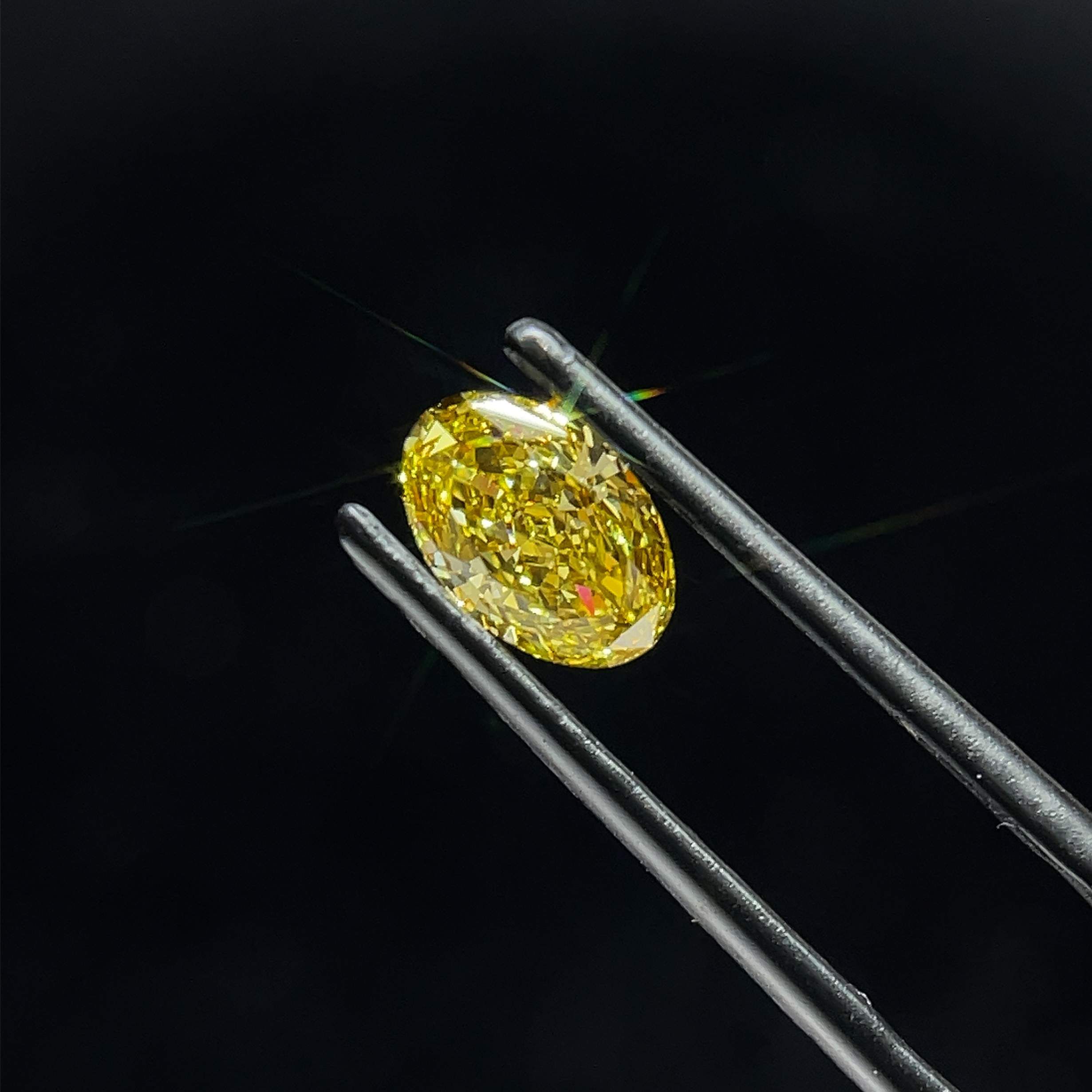 0.91 CT Fancy Intense Yellow OVAL