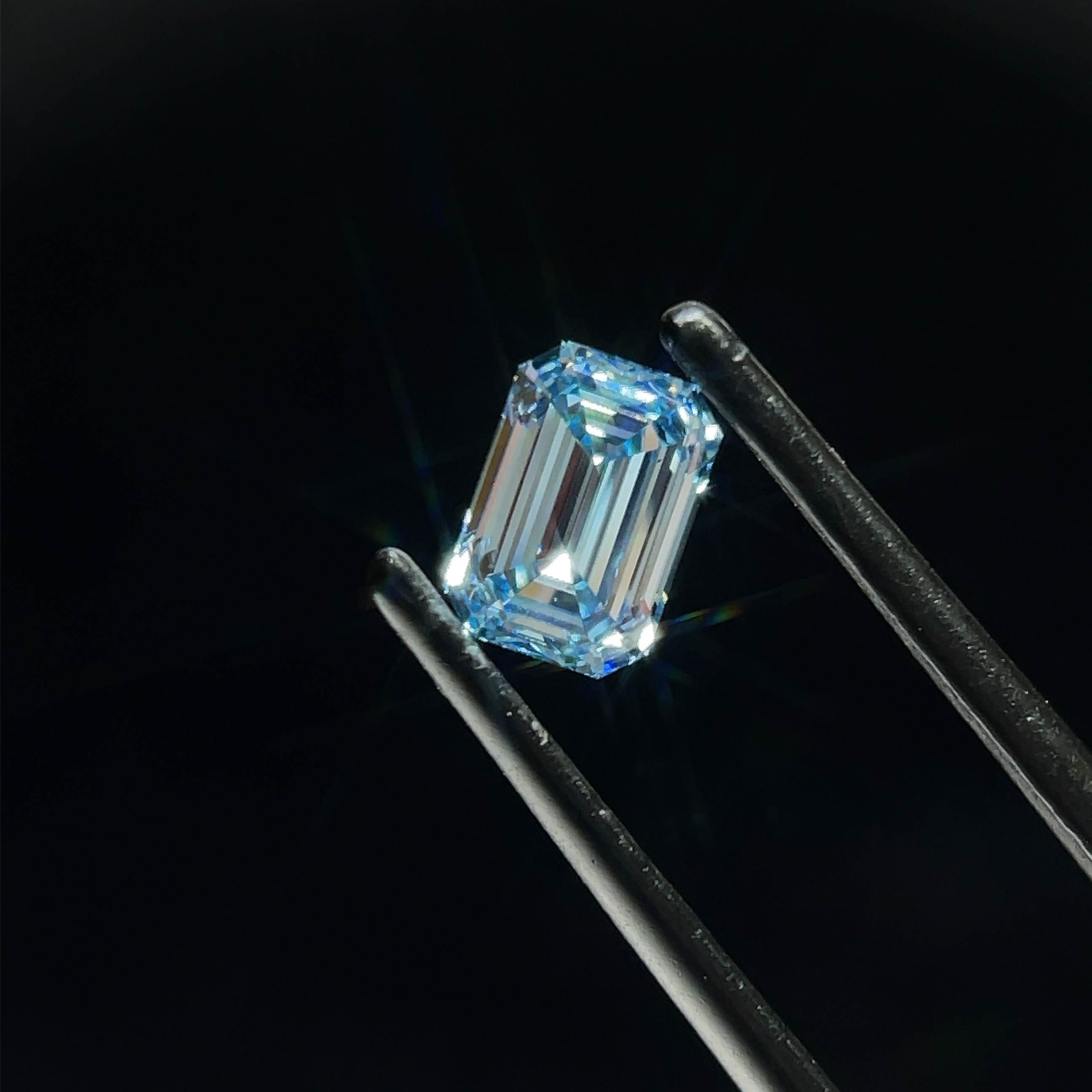0.77 CT Fancy Intense Blue EMERALD