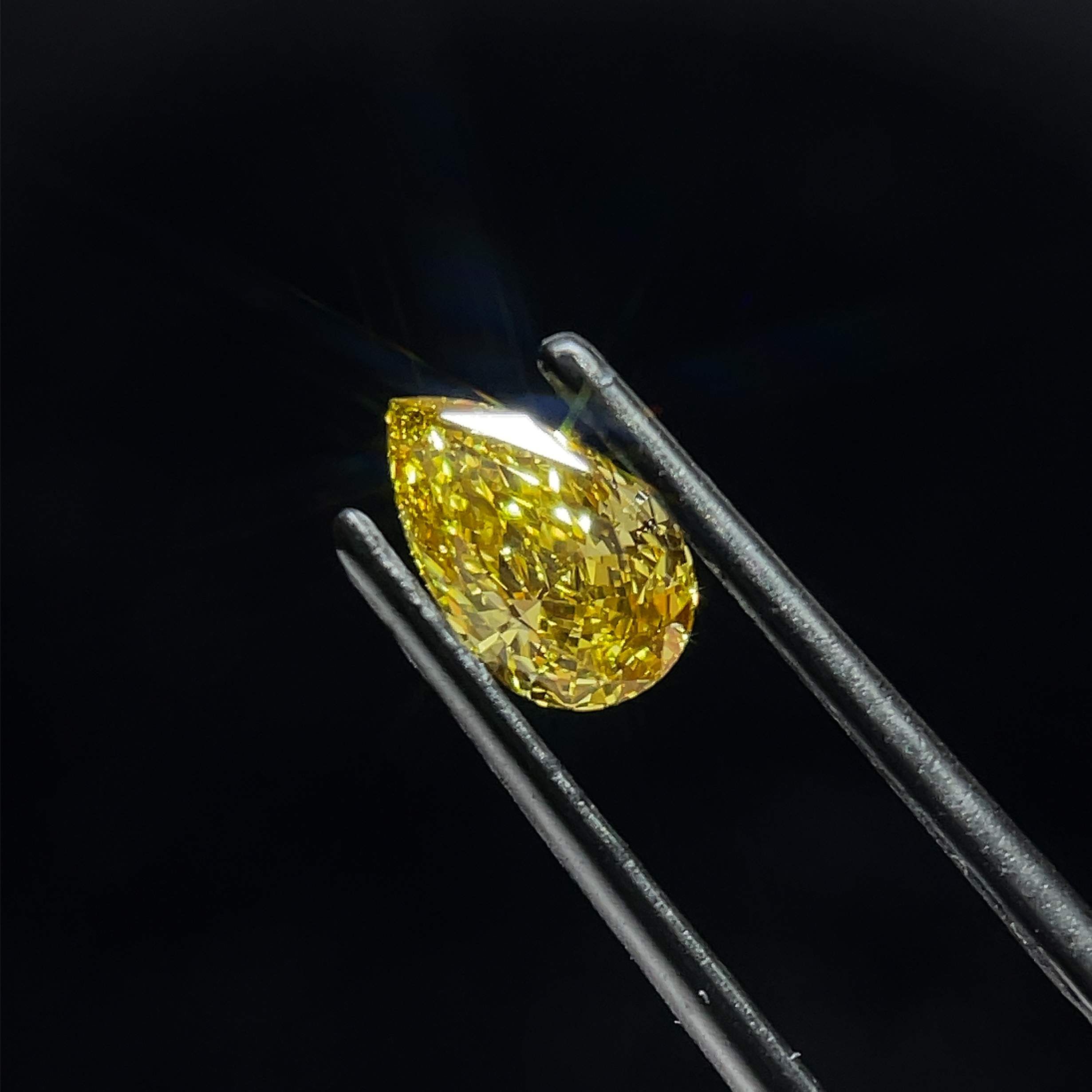 0.94 CT Fancy Intense Yellow PEAR