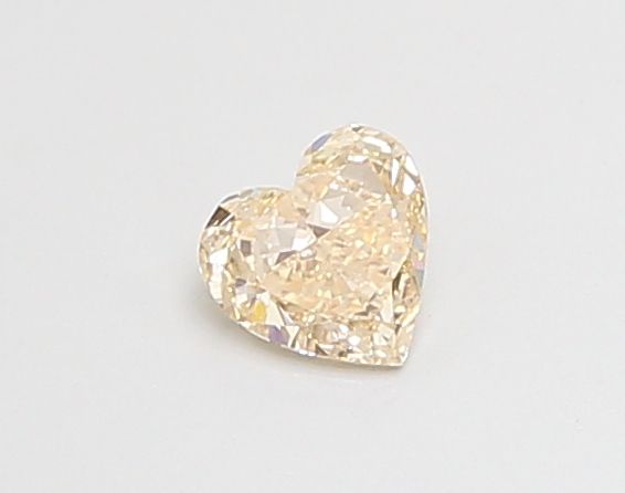 0.25 CT Fancy Orangey Pink HEART