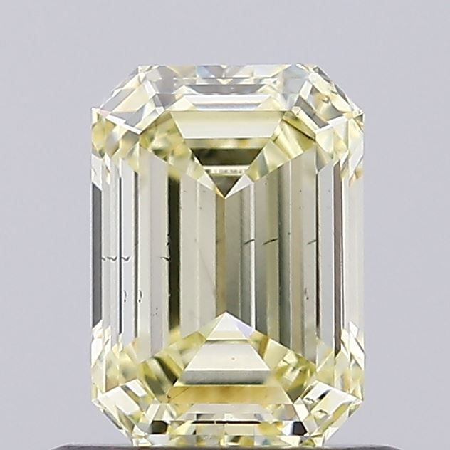 0.77 CT Fancy Yellow EMERALD