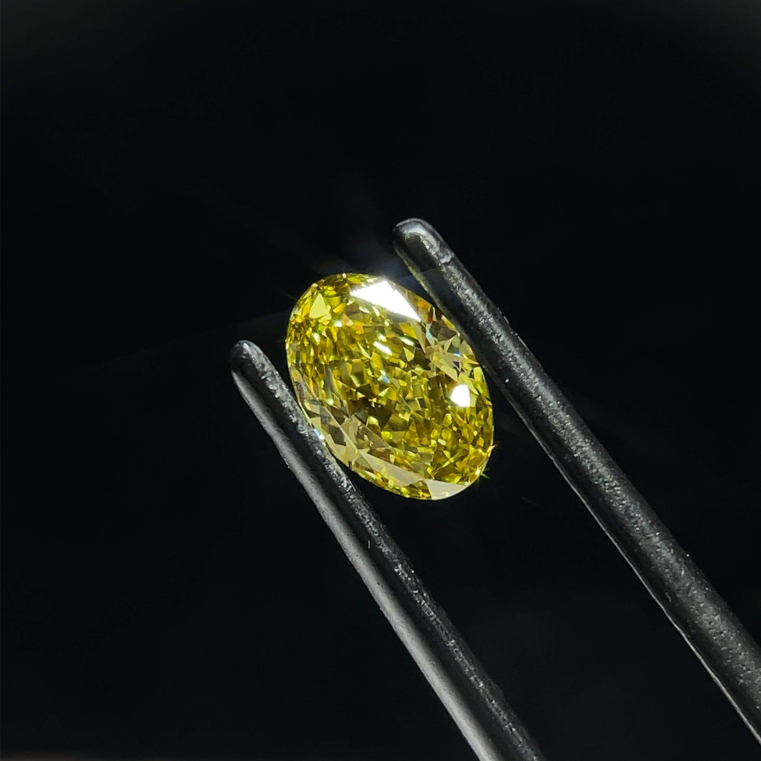 0.69 CT Fancy Intense Yellow OVAL