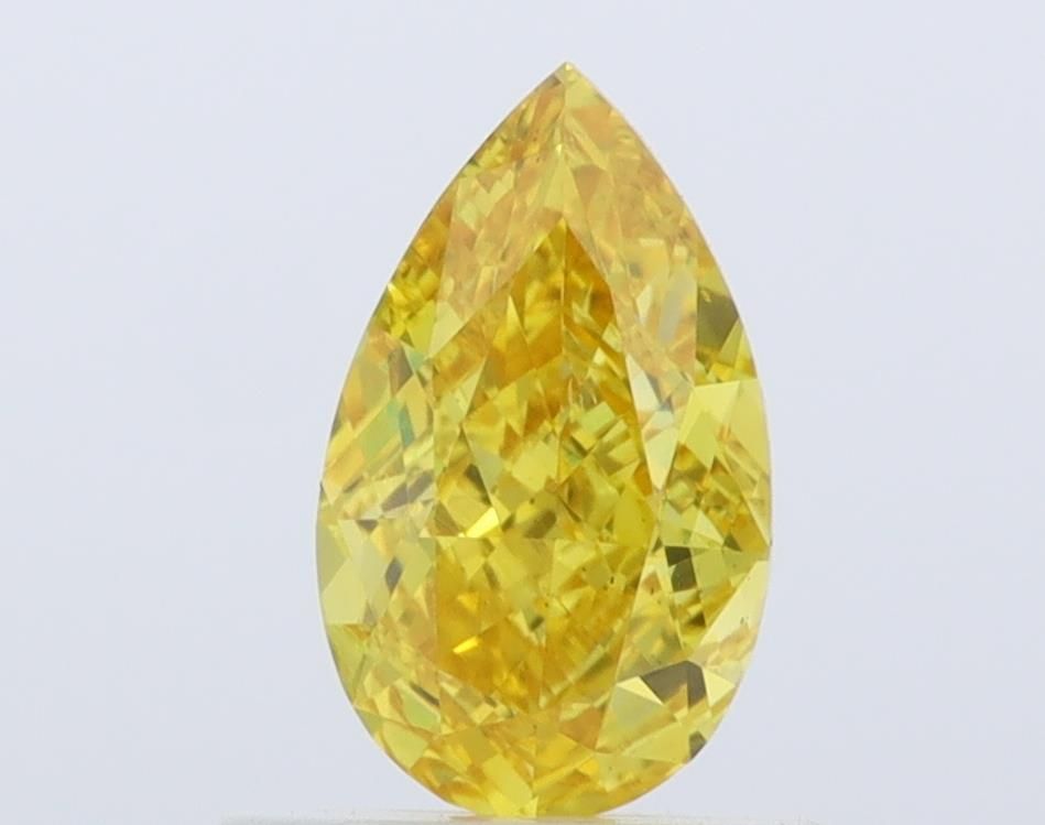 0.7 CT Fancy Vivid Yellow PEAR