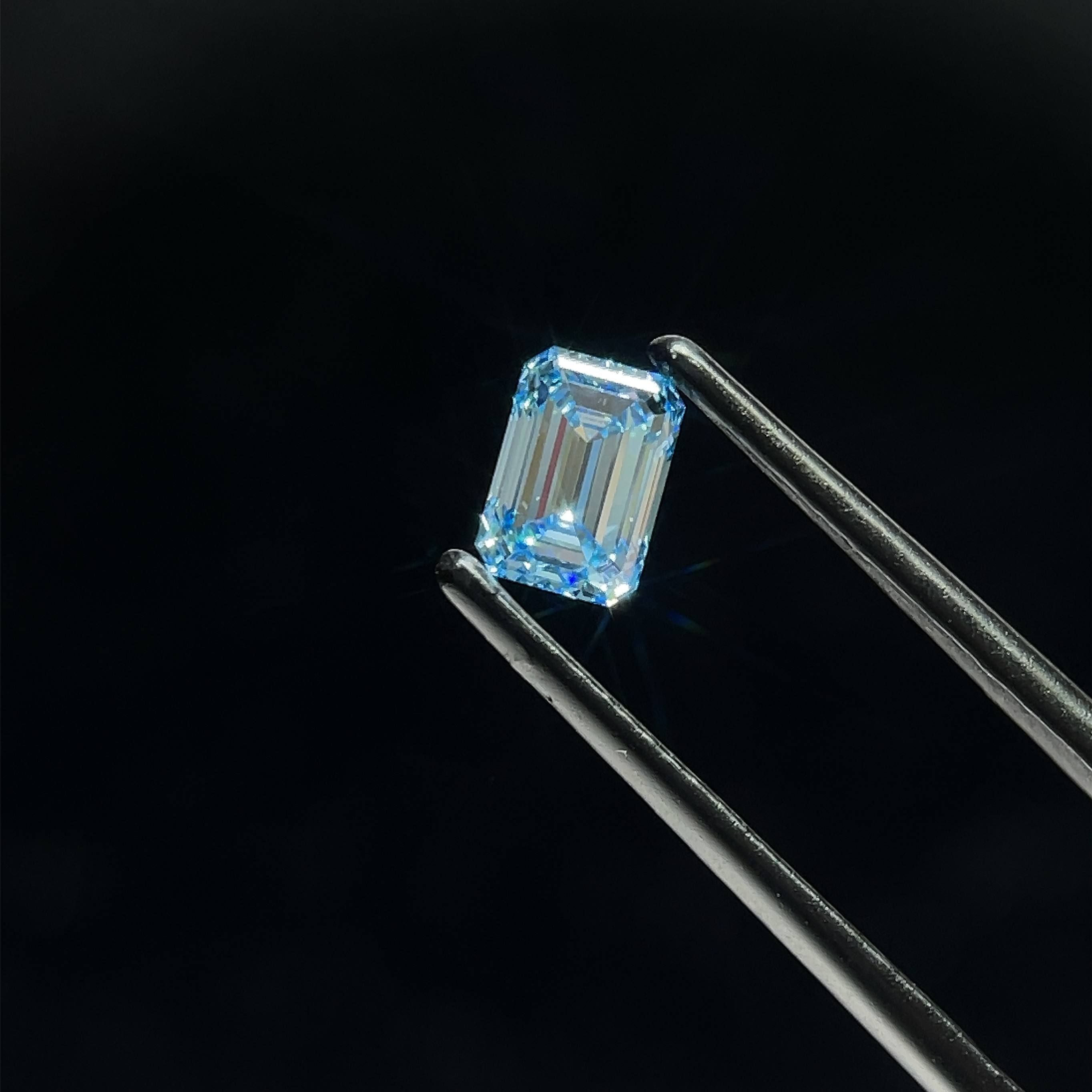 0.81 CT Fancy Intense Blue EMERALD