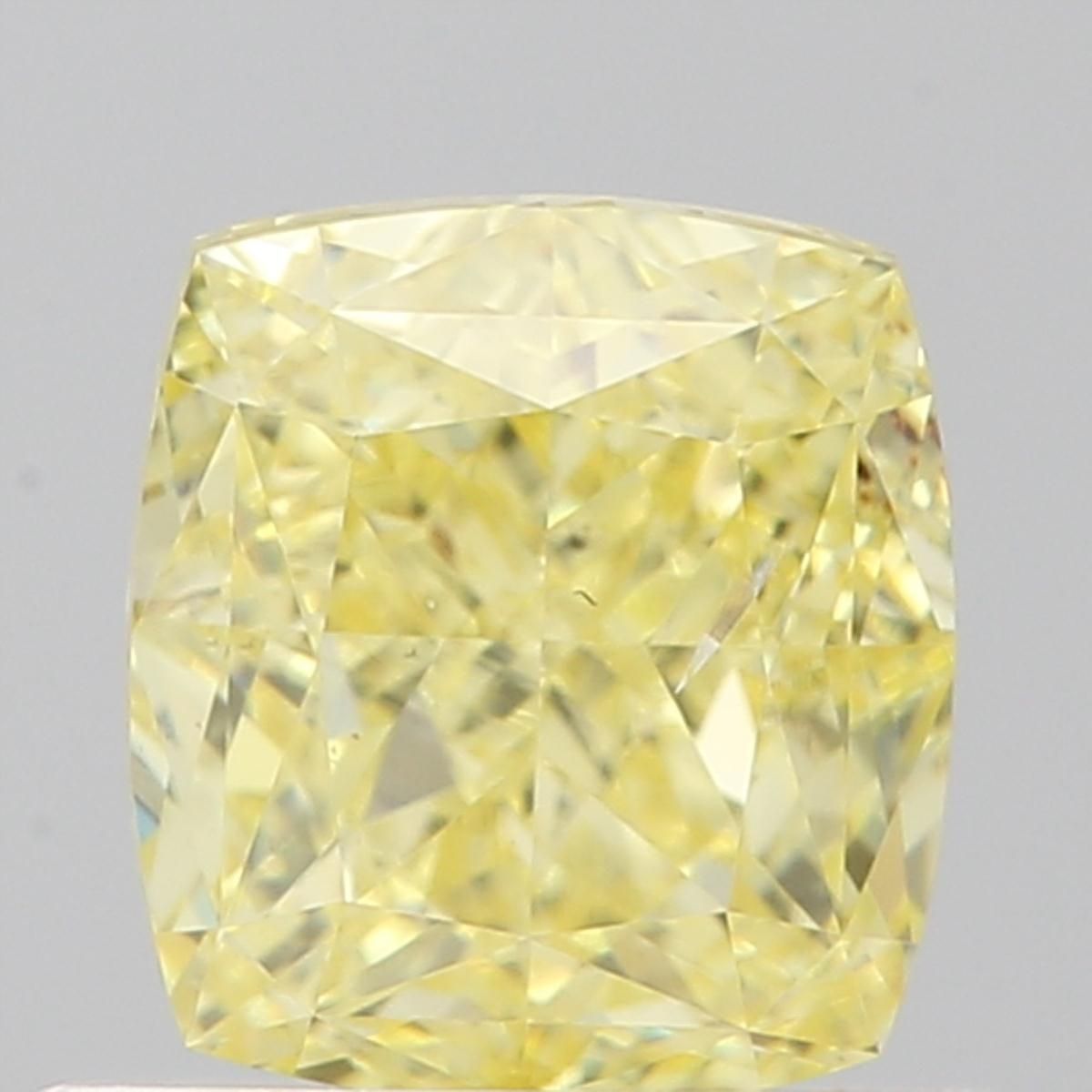 0.9-carat cushion diamond with null color, null cut, and SI2 clarity.
