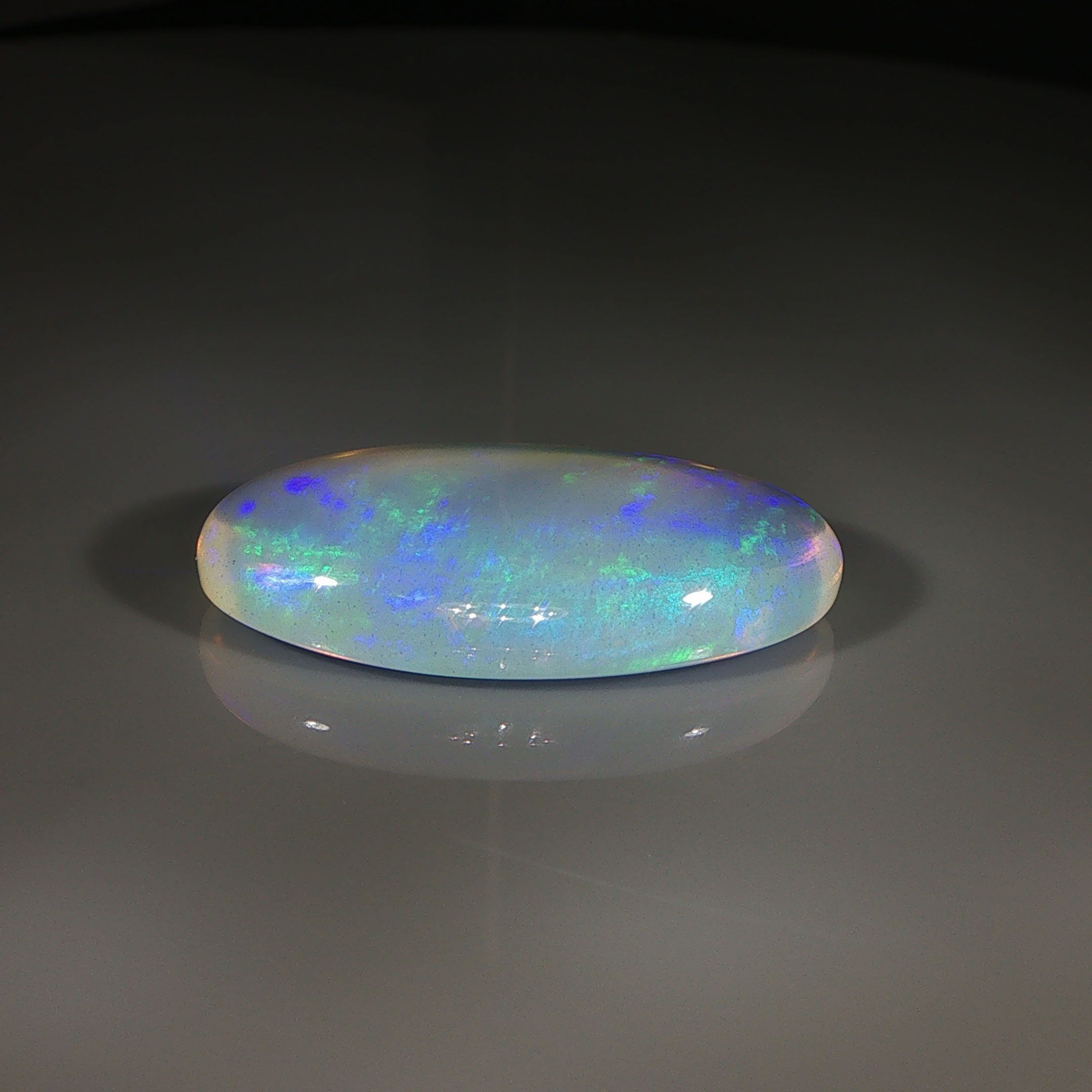 Opal 16,07 ct, biały, kaboszon