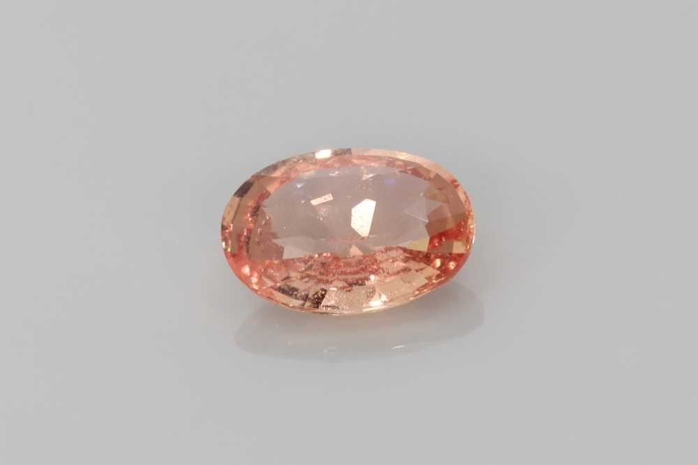 1.56 Carat Vivid Orange Oval Sapphire
