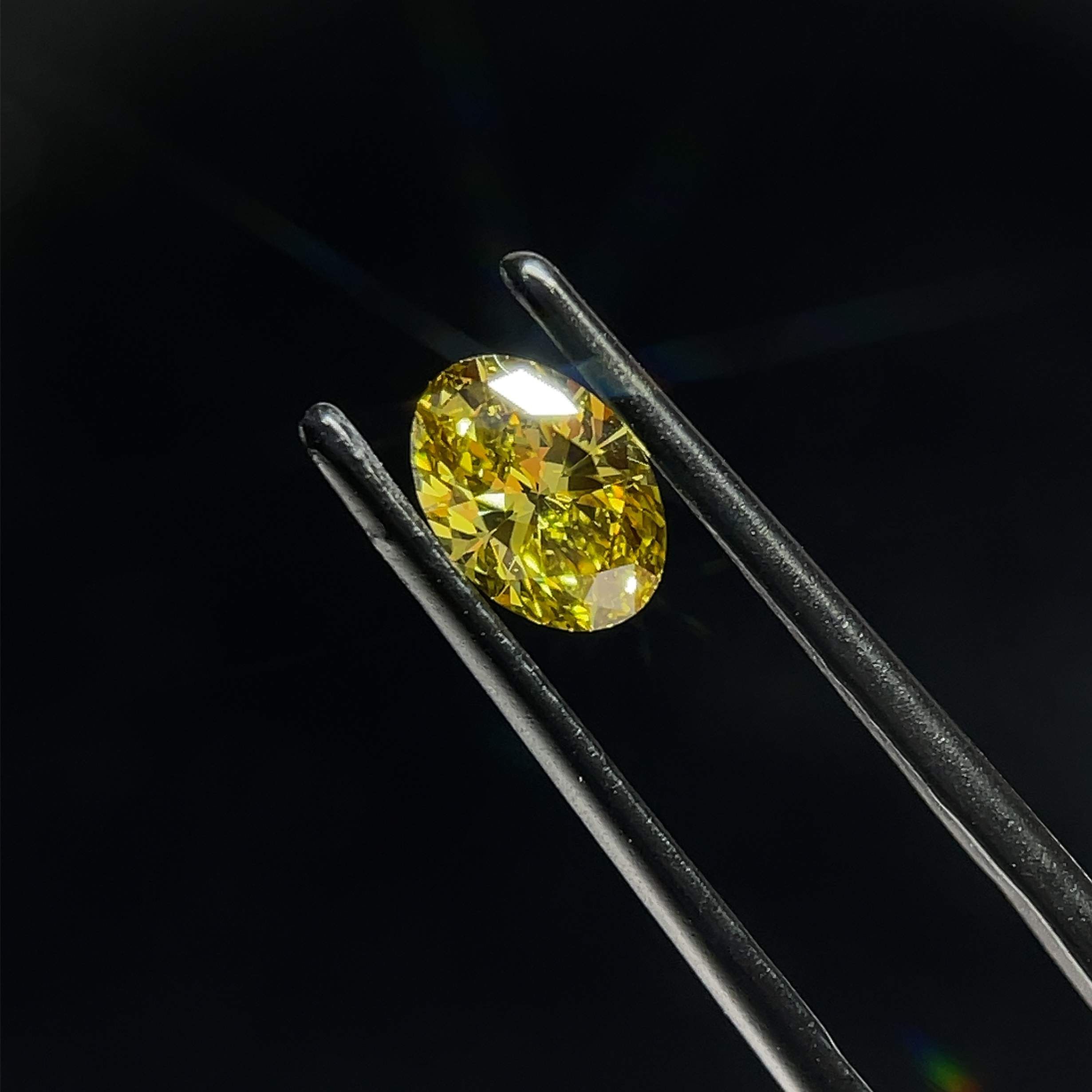 0.7 CT Fancy Intense Gray Yellow OVAL