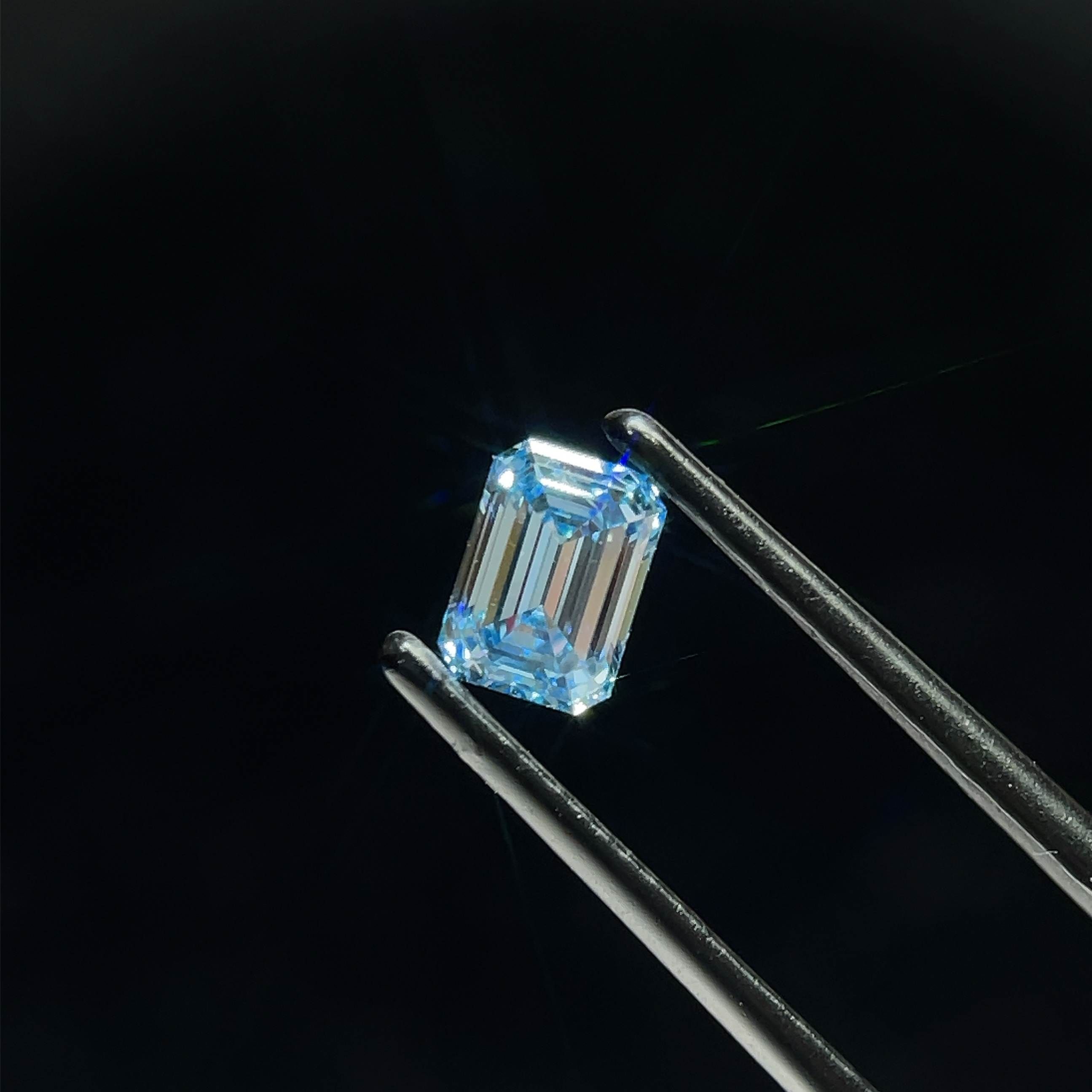 0.78 CT Fancy Intense Blue EMERALD