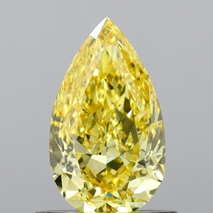 0.88 CT Fancy Vivid Yellow PEAR