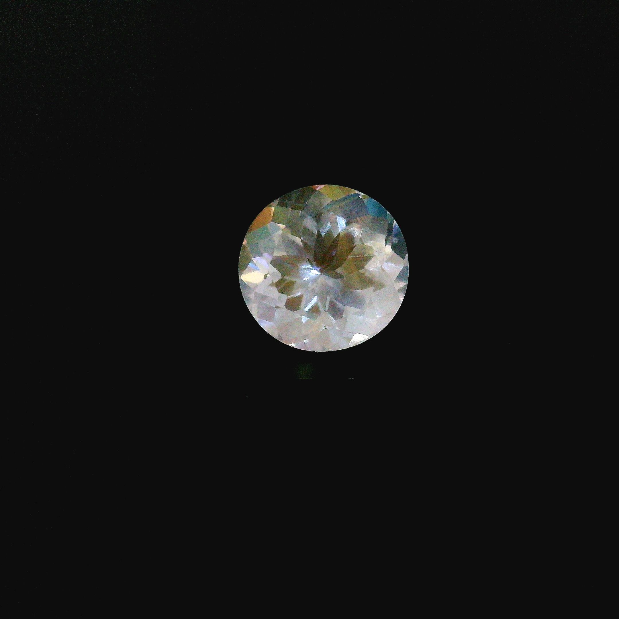 Kamień księżycowy 1,23 ct, biały, szlif okrągły