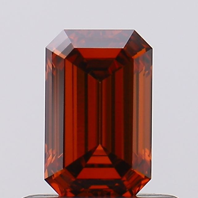 0.53 CT Fancy Vivid Orangey Red EMERALD