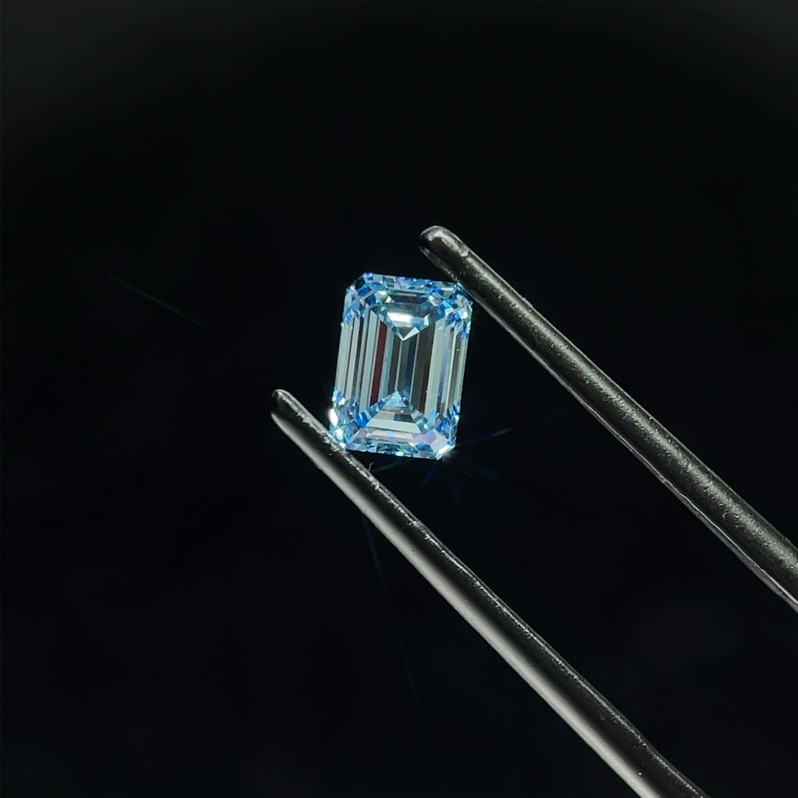 0.86 CT Fancy Intense Blue EMERALD