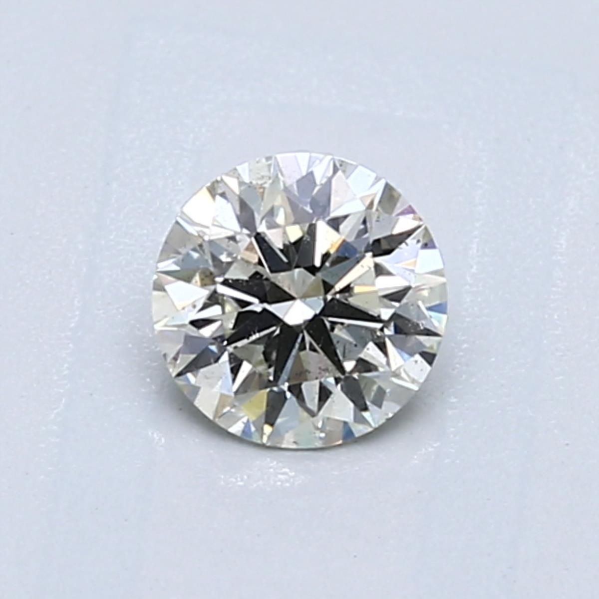 Diamant Rond 0.57 ct - Couleur K - Pureté SI2