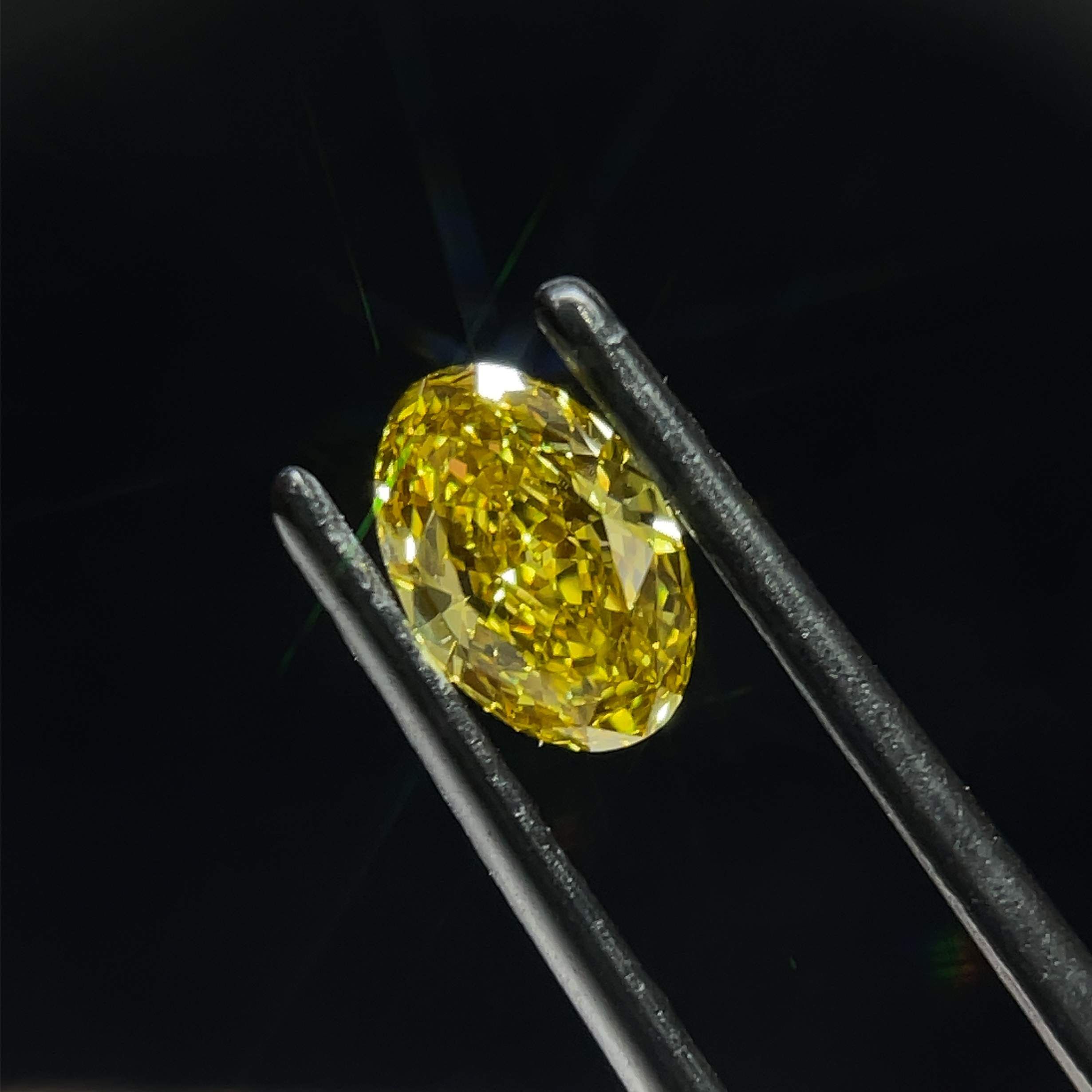 0.84 CT Fancy Intense Yellow OVAL