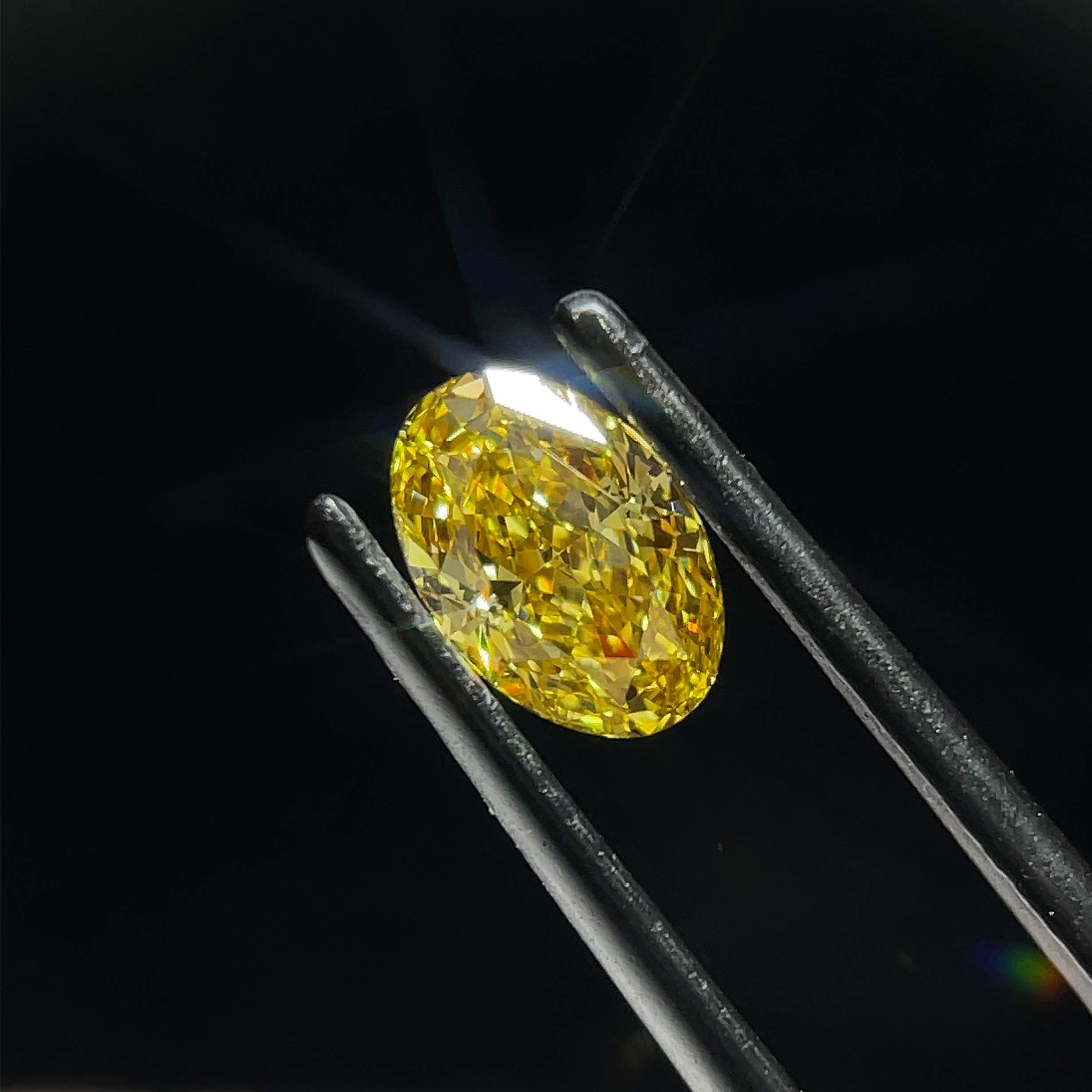 0.84 CT Fancy Intense Yellow OVAL