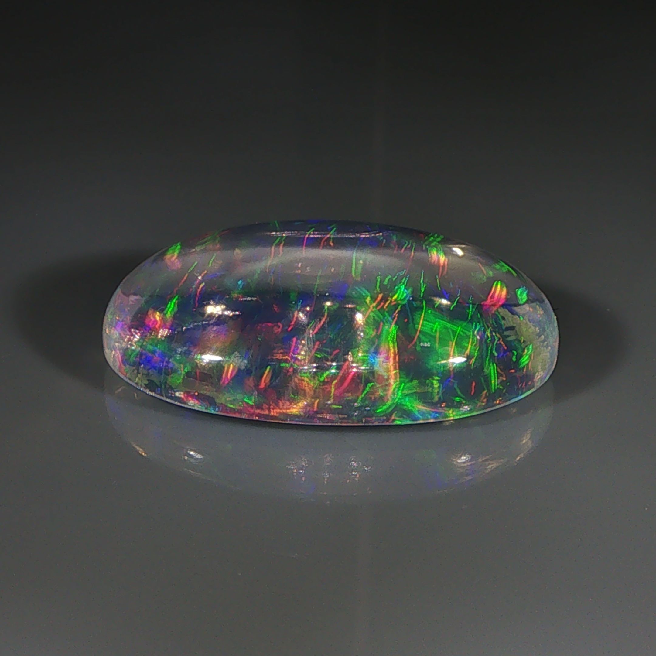 Opal 13,17 ct, biały, kaboszon