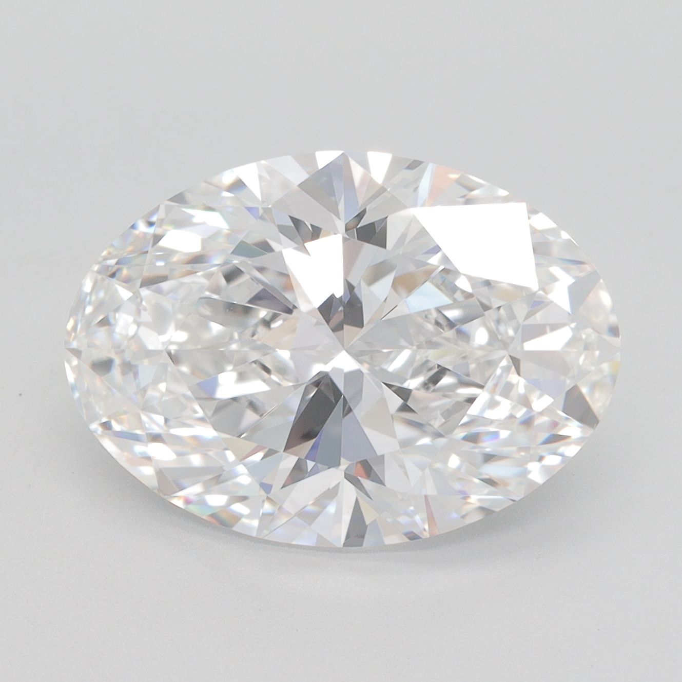 5.81-carat oval diamond with E color, null cut, and VVS1 clarity.