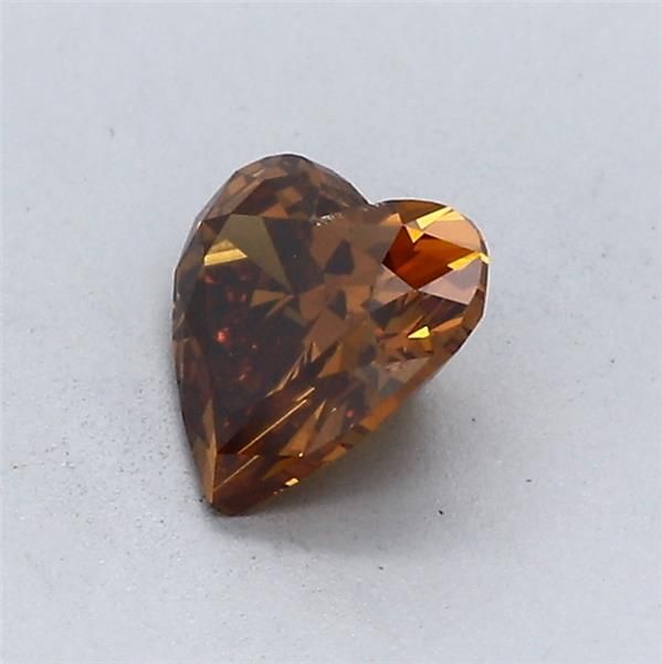 0.73-carat heart diamond with null color, null cut, and SI2 clarity.