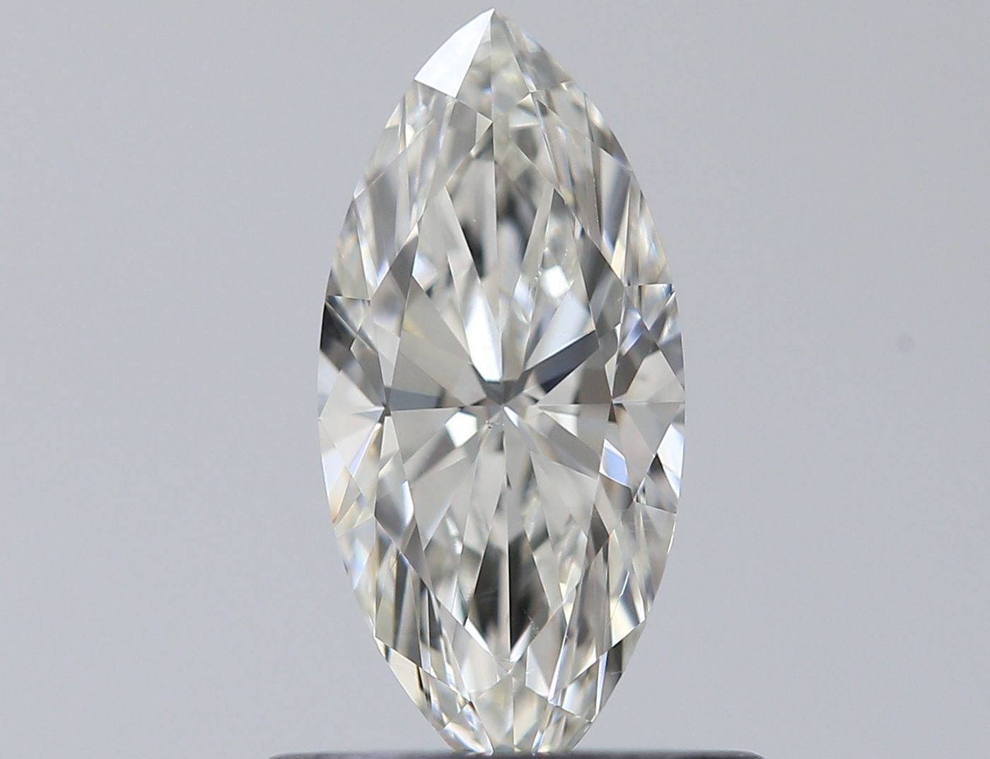 0.61-carat marquise diamond with J color, null cut, and SI1 clarity.