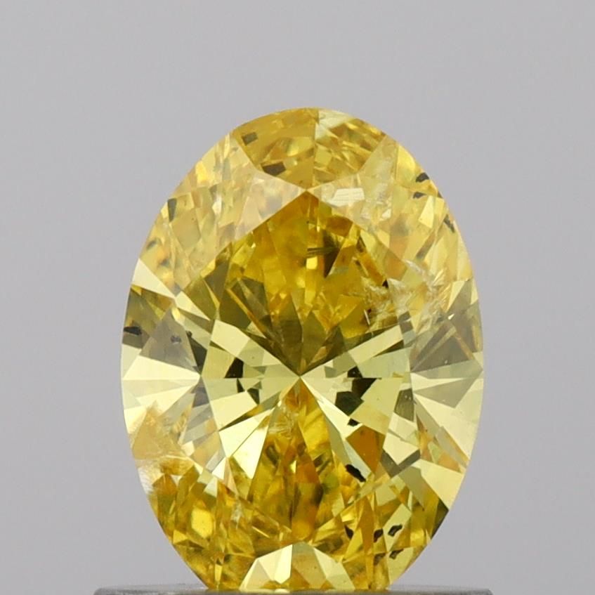 0.85 CT Fancy Vivid Yellow OVAL