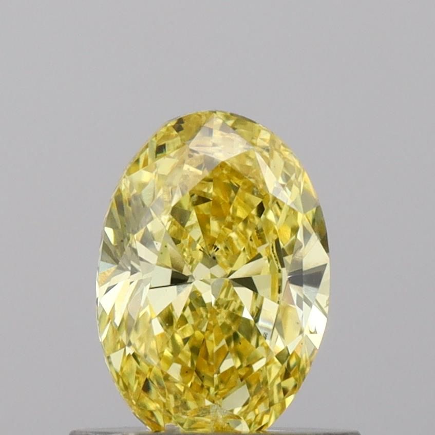 0.75 CT Fancy Vivid Yellow OVAL