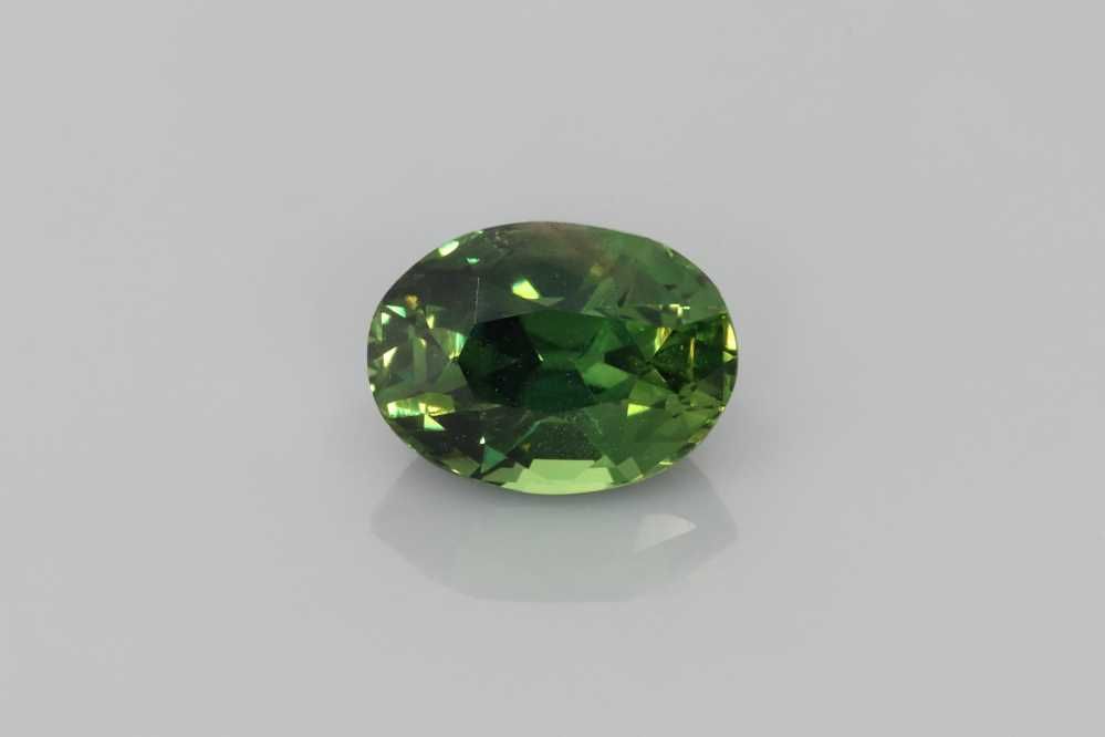 2.55 Carat Vivid Green Oval Sapphire