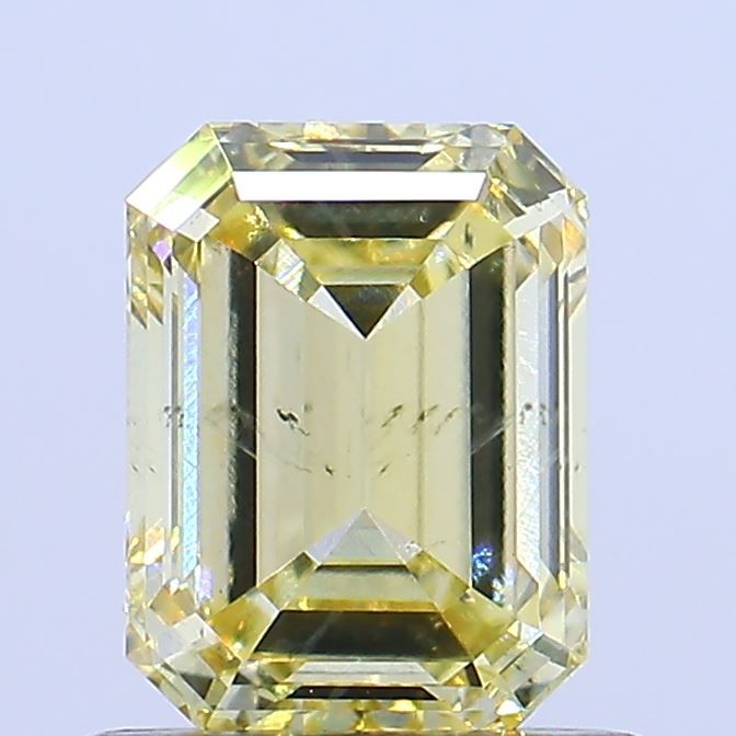 0.85 CT Fancy Yellow EMERALD