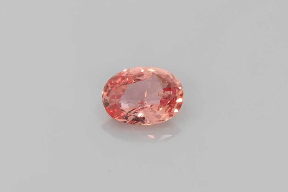 1.04 Carat Vivid Orange Oval Sapphire