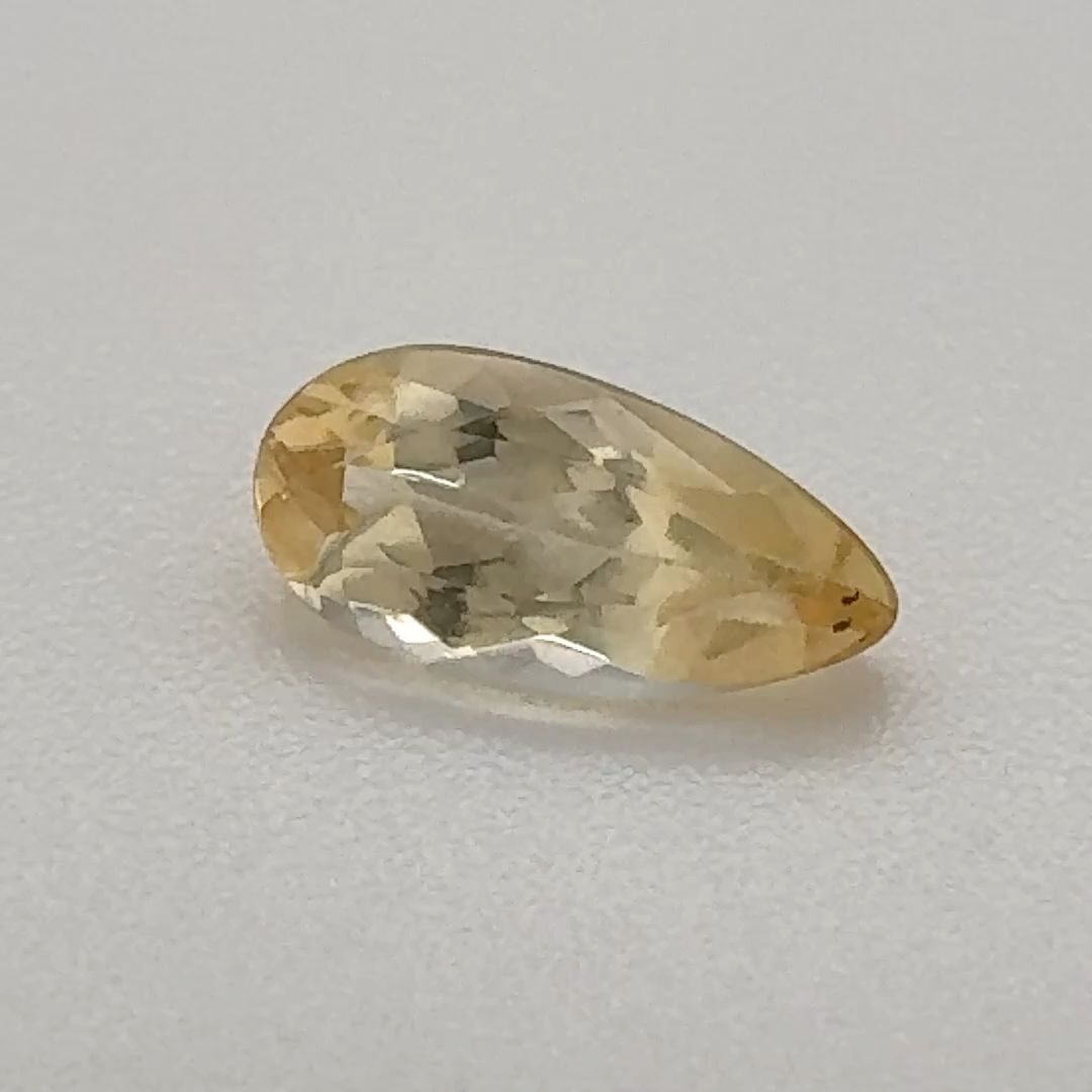 TOPAZ FACETED 0.605ct YELLOW Light Yellow SI BRAZIL NONE