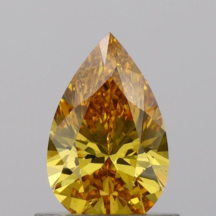 0.7 CT Fancy Vivid Yellow PEAR