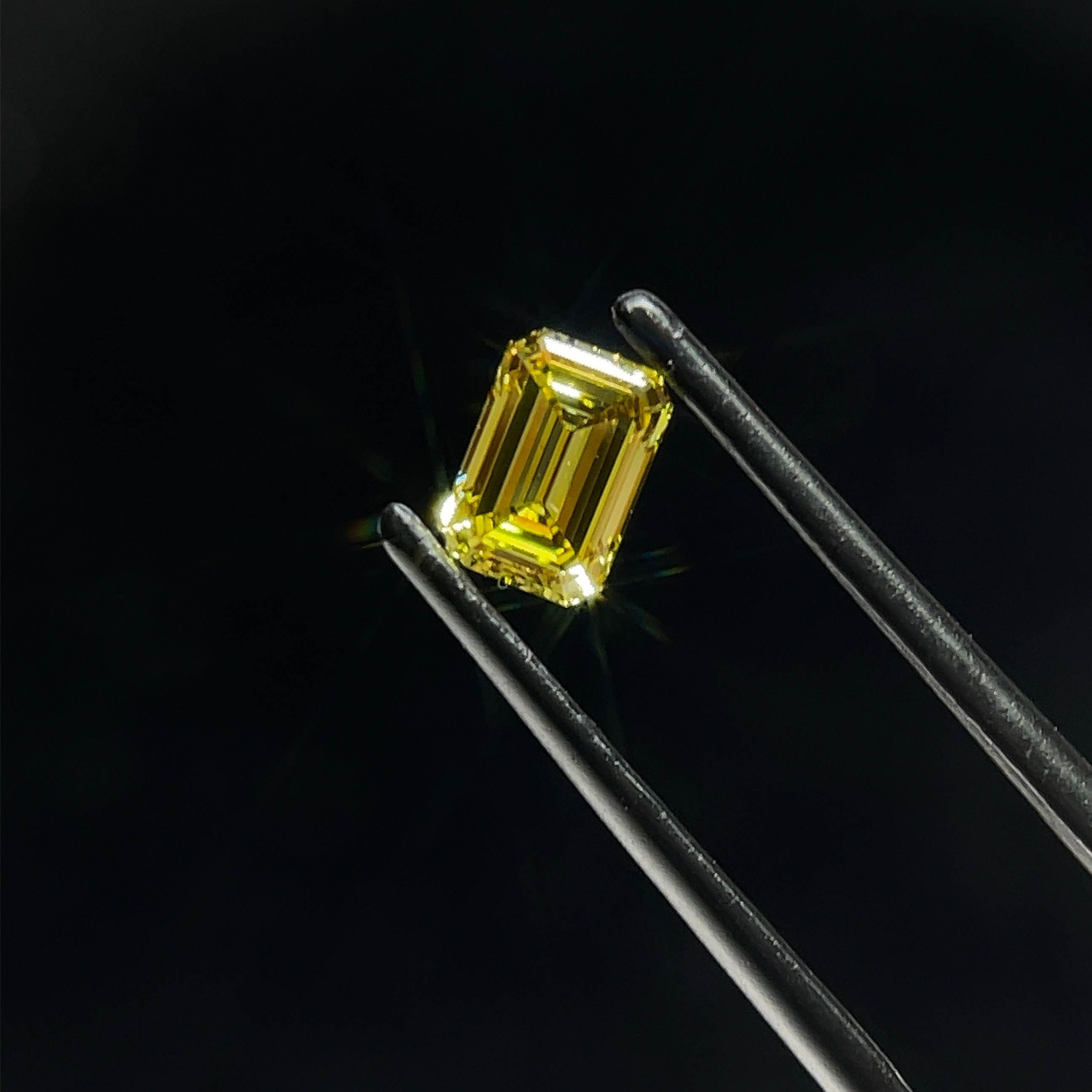 0.72 CT Fancy Yellow EMERALD