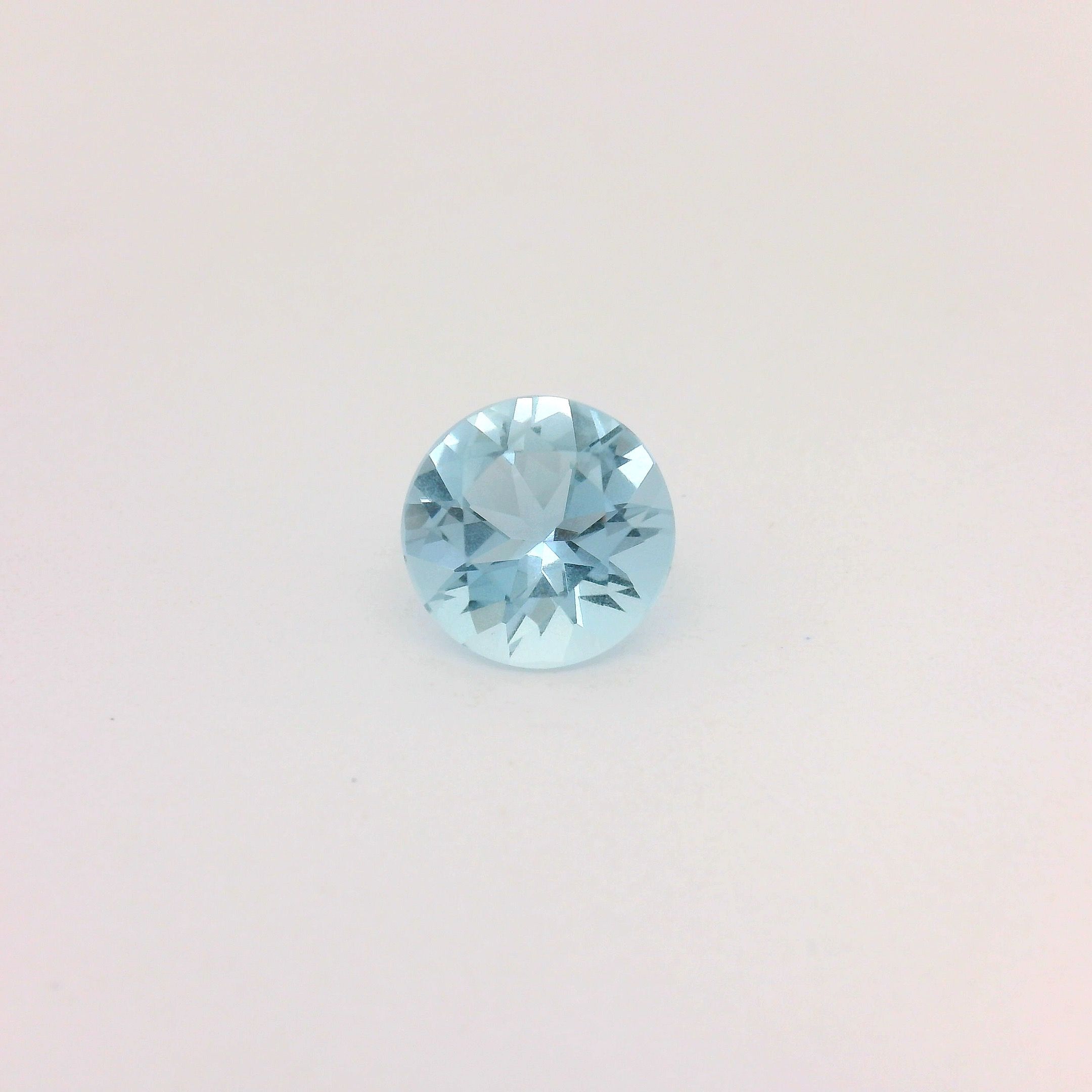 Akwamaryn 1,04 ct, niebieski, szlif okrągły
