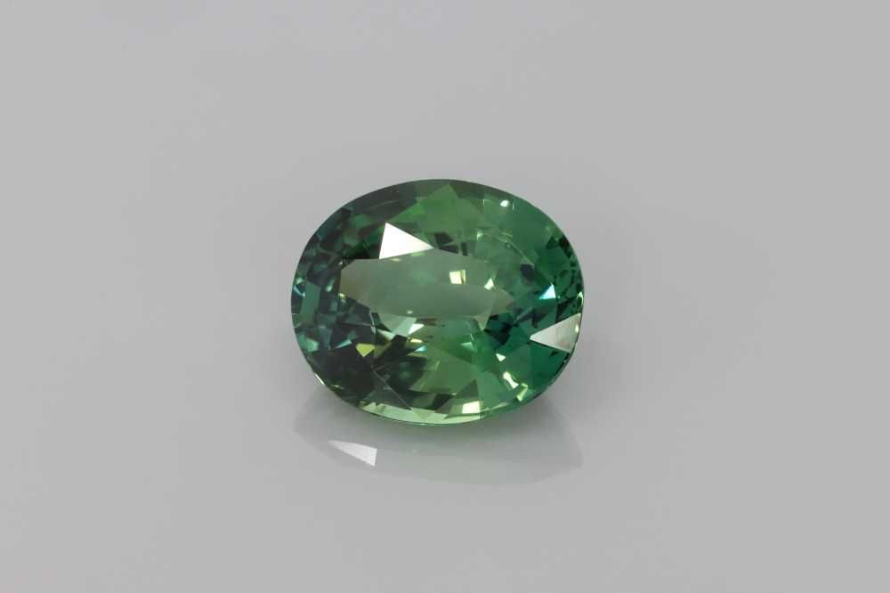 4.06 Carat Vivid Teal Oval Sapphire