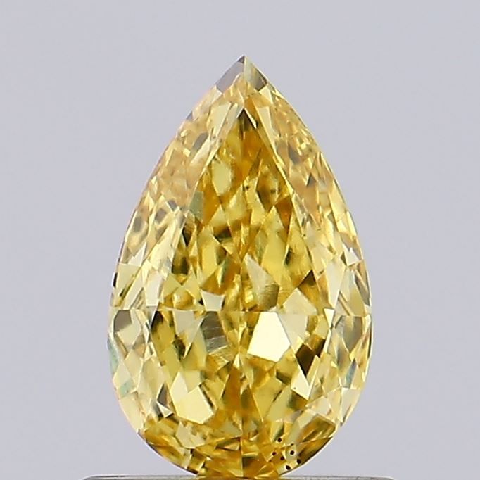 0.68 CT Fancy Vivid Brownish Yellow PEAR
