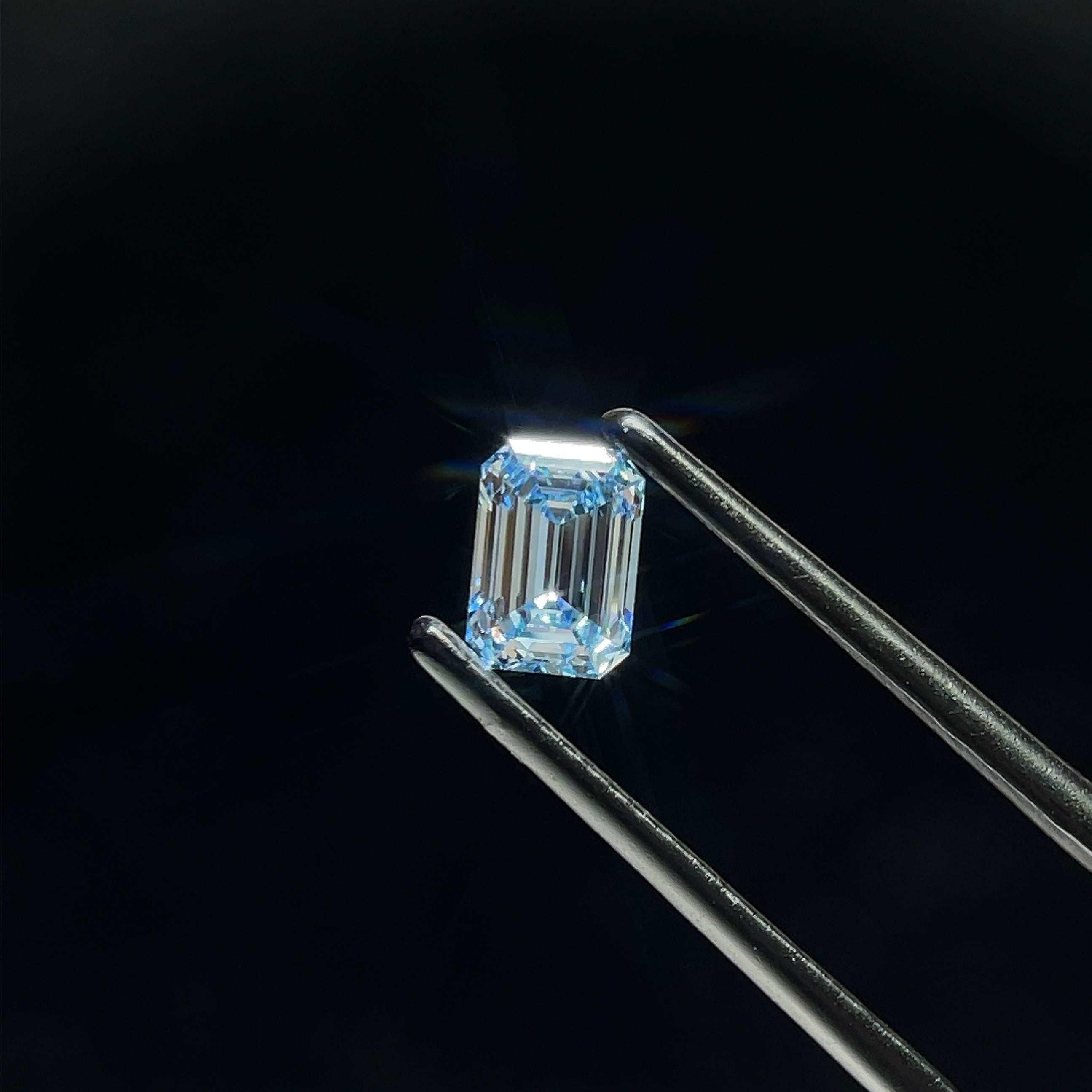 0.73 CT Fancy Intense Blue EMERALD