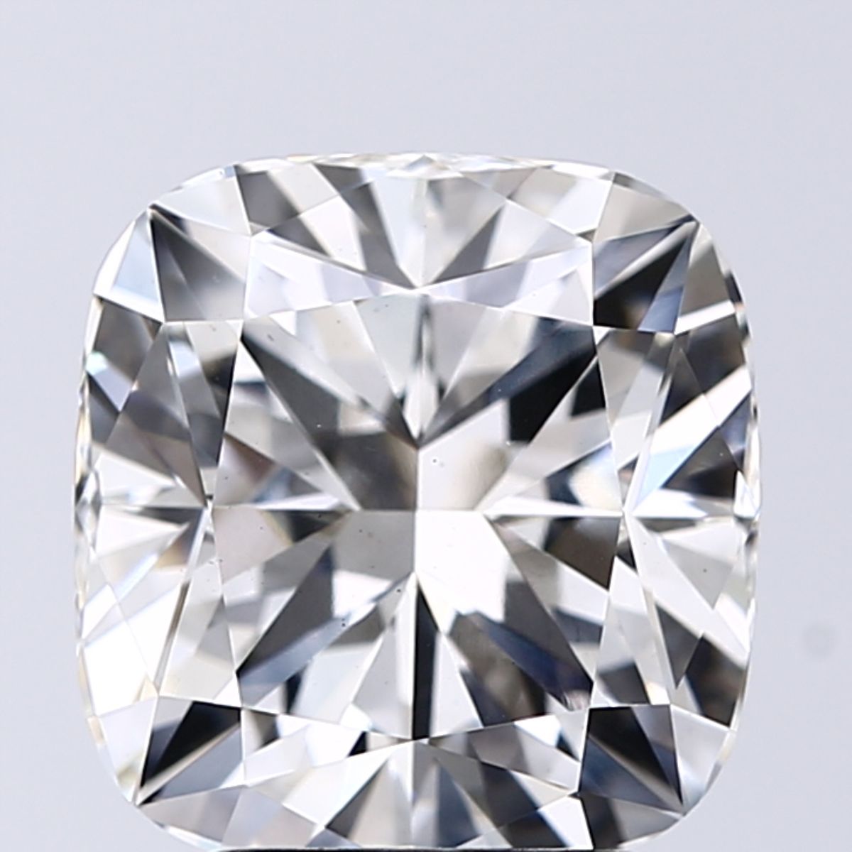 3.23-carat cushion diamond with G color, null cut, and VS2 clarity.
