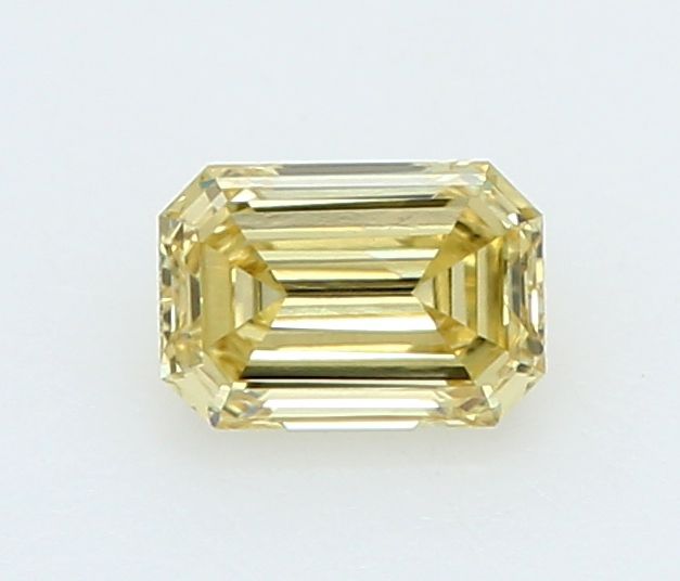 0.21 CT Fancy Yellow EMERALD